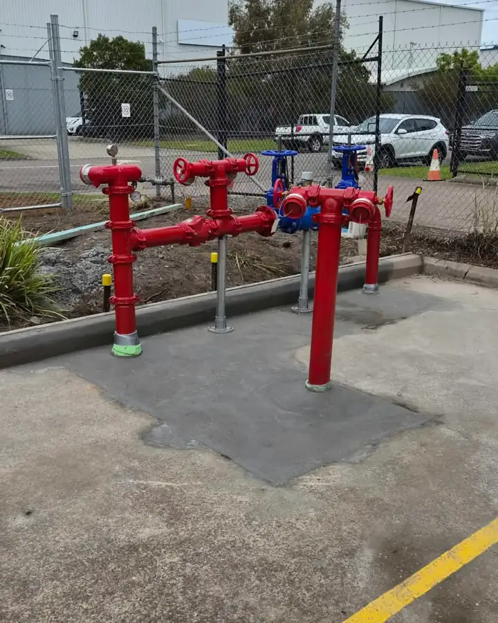 A hydrant install on a sealed slab with yellow line marking