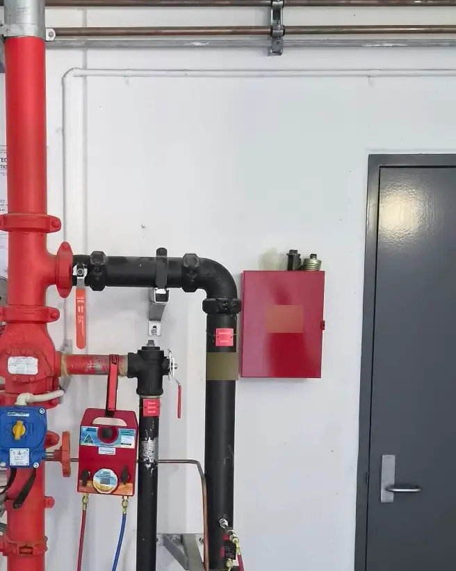 A sprinkler valve set in a plant room