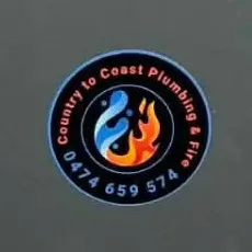 Our round Country to Coast sticker with the phone number, on a hot water unit